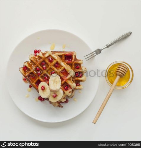 top view waffle with honey fork. Beautiful photo. top view waffle with honey fork