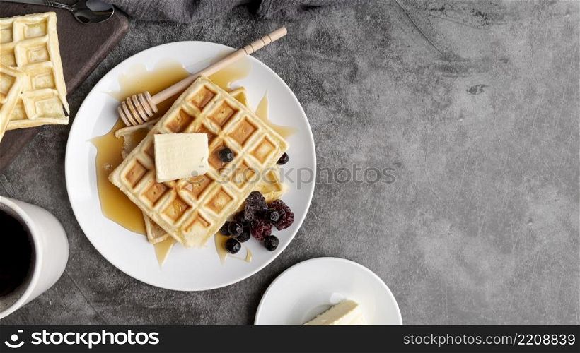 top view waffles plate with butter honey