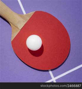 top view white ball ping pong paddle