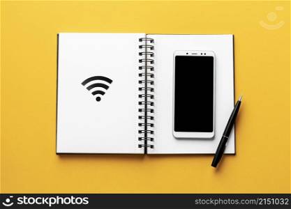 top view wi fi symbol with notebook smartphone