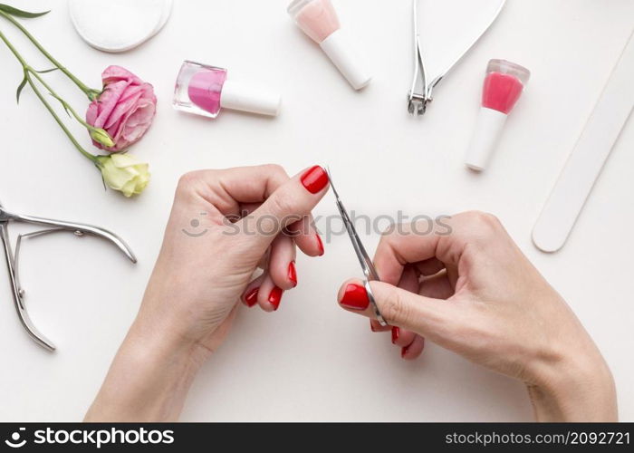 top view woman doing hand manicure