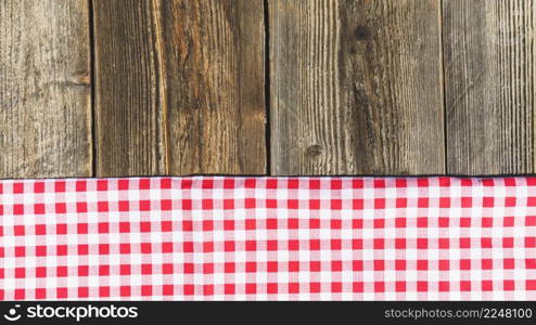 top view wooden plank checkered tablecloth