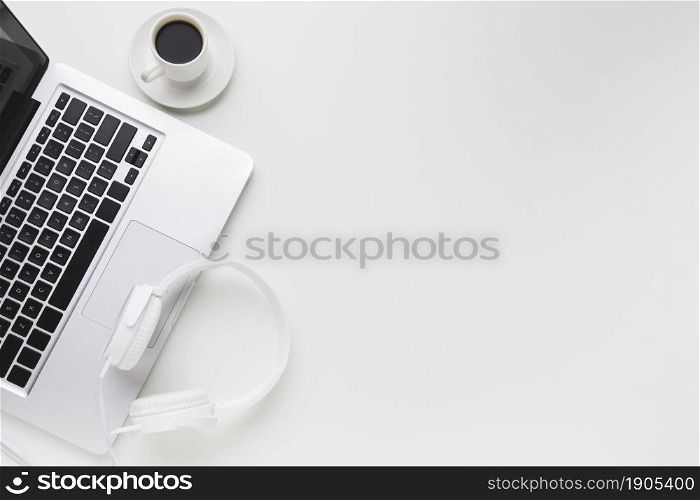 top view work space with laptop headphones. Beautiful photo. top view work space with laptop headphones