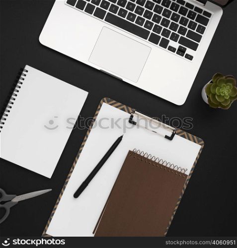 top view workspace with notepad laptop