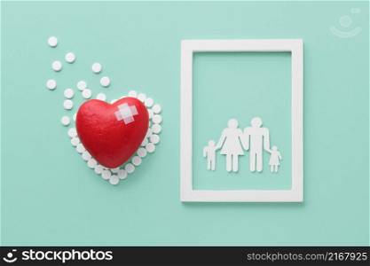 top view world heart day concept with family frame