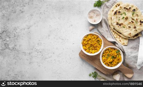 top view yellow rice pita arrangement. Resolution and high quality beautiful photo. top view yellow rice pita arrangement. High quality and resolution beautiful photo concept