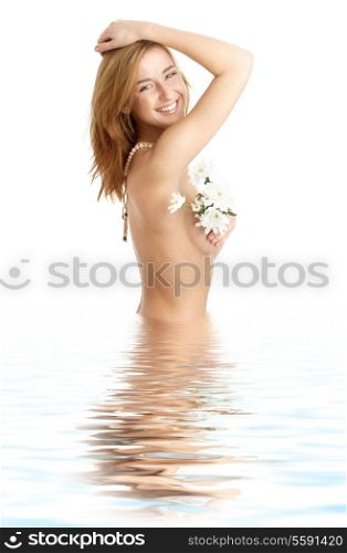 topless girl with white flowers in water