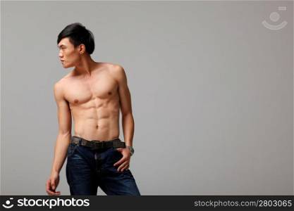 Topless man in jeans