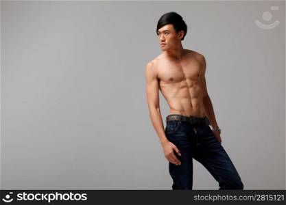 Topless man in jeans