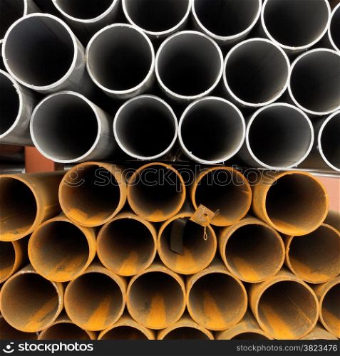 tops of construction pipes close up on outdoor warehouse in winter