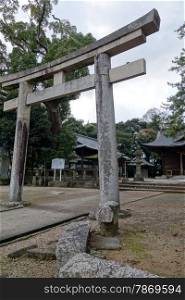 Torii stone gate - a symbol of japan temple. Torii stone gate