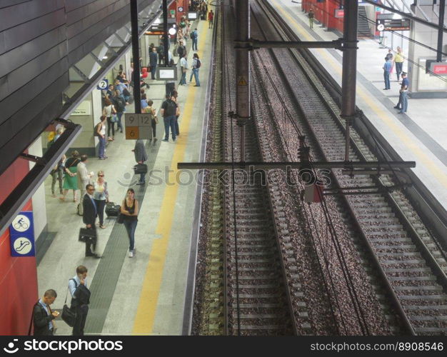 Torino Porta Susa station. TURIN, ITALY - JULY 30, 2014  Passengers in the new Torino Porta Susa main railway and subway station