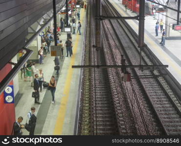 Torino Porta Susa station. TURIN, ITALY - JULY 30, 2014  Passengers in the new Torino Porta Susa main railway and subway station