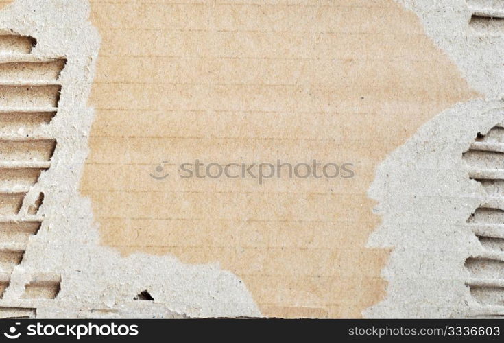 Torn cardboard scrap used as a background