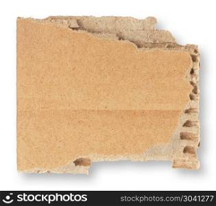 Torn piece of cardboard isolated on white background