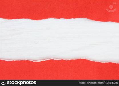 Torn red paper with a wooden background for your text