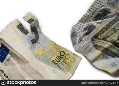 torn ripped money, real broken five euro bill isolated on white close-up. torn ripped money, real broken five euro bill isolated on white