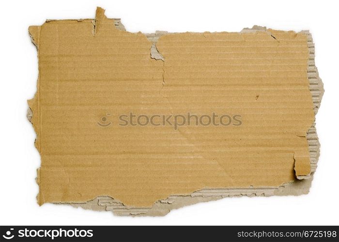 Torn section of a corrugated shipping carton. Background for writing / shipping.