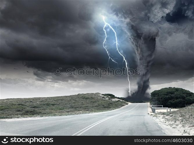 Tornado. Black tornado funnel and lightning on road