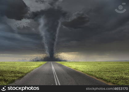 Tornado on road. Image of powerful huge tornado twisting on road