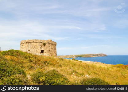 Torre d?en Penjat uncared fort scenery at Menorca, Spain