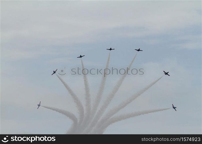 TORRE DEL MAR, MALAGA, SPAIN-JUL 31: Aircraft CASA C-101 of the Patrulla Aguila taking part in a exhibition on the 1st airshow of Torre del Mar on July 31, 2016, in Torre del Mar, Malaga, Spain. Aircraft CASA C-101 of the Patrulla Aguila