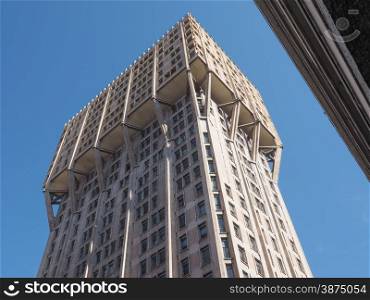 Torre Velasca Milan. MILAN, ITALY - MARCH 28, 2015: The Torre Velasca designed in 1955 by BBPR is a masterpiece of Italian new brutalist architecture