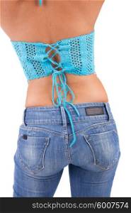 Torso of a beautiful woman in jeans - isolated