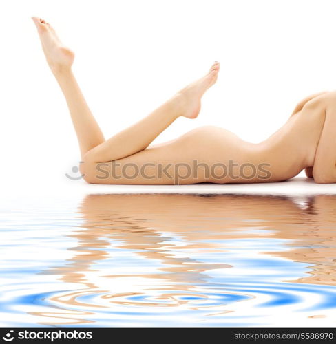 torso of relaxed naked woman over white