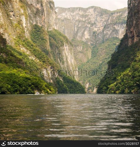 Tour Boats In Sumidero Canyon Mexico. Tour boats and tourists travel through the Sumidero Canyon Chiapas, Mexico