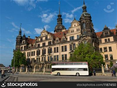 Tour bus at European attractions, castle. Summer tourism and travels, ancient architecture and buildings, famous europe landmark