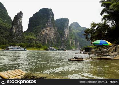 Tourboats in a river, XingPing, Yangshuo, Guangxi Province, China