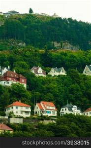 Tourism and travel. Cityscape town houses on hills in city Bergen, Norway Europe.