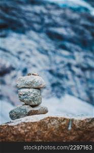 Tourism holidays and travel. Stones stack in snowy norwegian mountains Norway Scandinavia.. Stones stack in mountains, Norway
