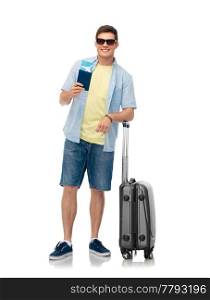 tourism, summer holidays and vacation concept - smiling young man in sunglasses with travel bag and air ticket over white background. man in sunglasses with travel bag and air ticket