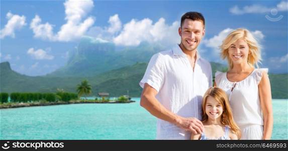 tourism, travel and family concept - happy mother, father and daughter over bora bora background. happy family over bora bora background