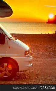 Tourism vacation and travel. C&er van on nature at sunrise over sea surface, Greece Peloponnese.. C&er car on nature at sunrise. Travel
