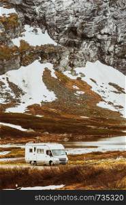 Tourism vacation and travel. Camper van and mountains landscape in Norway. Camper car in norwegian mountains