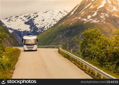 Tourism vacation and travel. Camper van and norwegian mountains landscape. Camper car in norwegian mountains