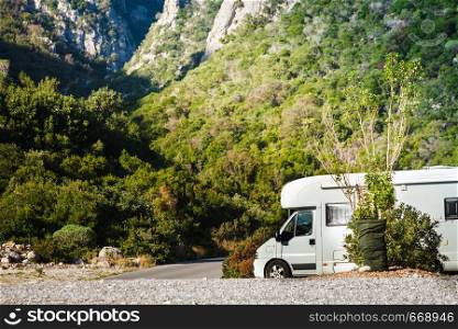 Tourism vacation and travel. Camper van motorhome on nature in Greece. Camper car motorhome on nature