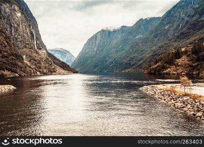 Tourism vacation and travel. Mountains and fjord Sognefjord in Norway, Scandinavia.. Tourism and travel. Mountains and fjord in Norway.