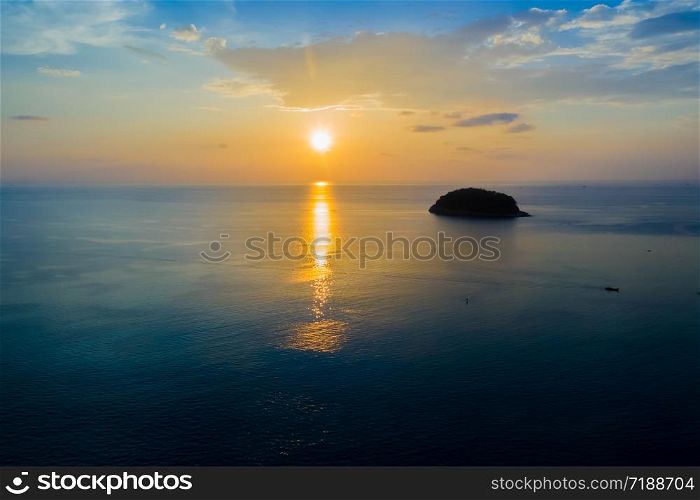 Tourism watching beautiful sea with sunset scene. Aerial View