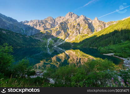 tourist attraction of Poland lake Morskie Oko in the Tatra mount. tourist attraction of Poland lake Morskie Oko in the Tatra mountains at dawn