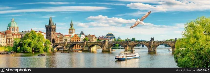 Tourist boat near the Charles bridge in Prague. Tourist boat in Prague