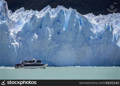 Tourist boat near the Perito Moreno Glacier is a glacier located in the Los Glaciares National Park in Patagonia in the southwest of Santa Cruz province in Argentina.
