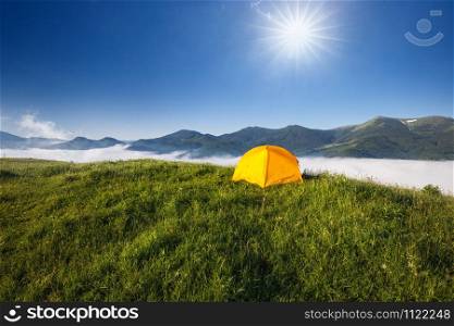 Tourist camping tent in a mountains. Carpathian, Ukraine, Europe. Beauty world.