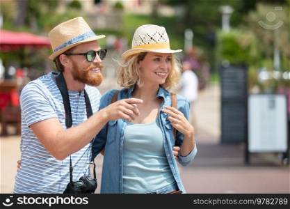 tourist couple are discovering a new town