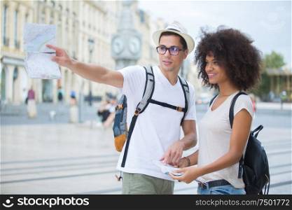 tourist couple wandering in beautiful city of bordeaux