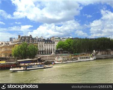 Tourist cruise boats on river Seine in Paris, France.