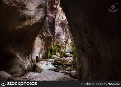Tourist in Avakas Gorge. Paphos District, Cyprus. Famous small canyon in Sounh Cyprus.